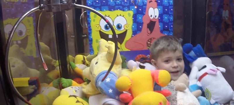 children in claw machine